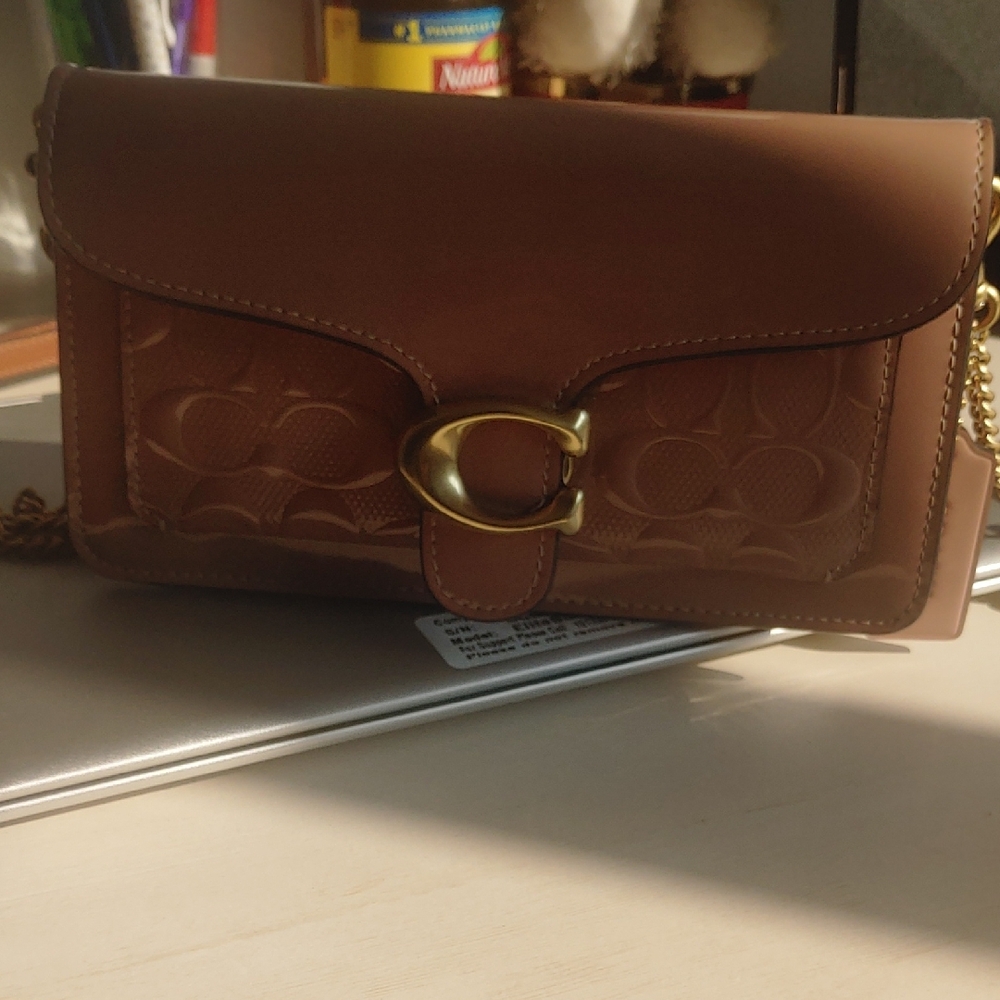 Coach Tan Leather Clutch with Gold Accent